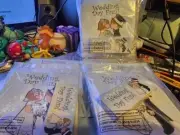 20 coloring books and cratons and 24 sticker sets for kids on wedding day