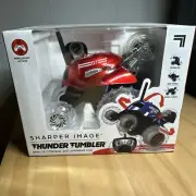 NIB SHARPER IMAGE~"THUNDER TUMBLER"~REMOTE CONTROL 360* SPINNING CAR~WIRELESS RC