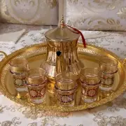 Moroccan stainless steel teapot set, five beldi crystal glasses and brass servin