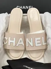$1.4K 2023 CHANEL WHITE CC CHA NEL LOGO BEIGE LEATHER FLAT SHOES SLIDES MULES 38