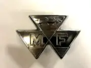 FRONT BADGE (CHROME). COMPATIBLE WITH: MASSEY FERGUSON: 35 SERIES (SEE LIST)
