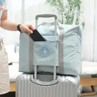 在飛比找ETMall東森購物網優惠-禮袋插桿式女手提可掛旅游行李包