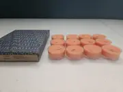 PartyLite 12 Pack Tea Lights - Mistletoe Orange