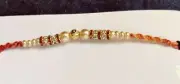 IGP Gold/Red Pearl Bead Rakhi Bracelet - Round bead (13197)