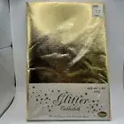 Metallic Gold Tablecloth Flannel Backed Oval 60”x84” Santa’s Workbench