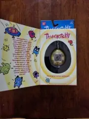 Unopened Original 1997 Tamagotchi Green Camo Shell