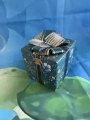 Wrapped Floral Present Sankyo Music Box by Jersey Shore Music Box Co.