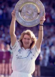 Steffi Graf of Germany lifts the trophy after defeating Martina N - Old Photo 9