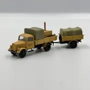 Mercedes-Benz with a field kitchen towing a trailer, scale 1/87 (HO)