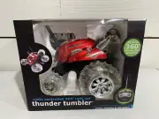 SHARPER IMAGE THUNDER TUMBLER REMOTE CONTROL 360 SPINNING STUNT CAR RED NEW