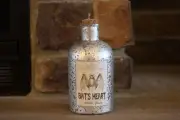 METALLIC SILVER AGED GLASS BOTTLE WITH CORK LABEL "BAT'S HEART 100% PURE" W/BAT