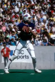 Joe Ferguson Buffalo Bills drops back to pass at an NFL football - 1976 Photo 2