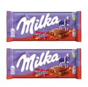 909956 2x 100g BLOCK MILKA DAIM ALPINE MILK CHOCOLATE WITH ALMOND CARAMEL PIECES
