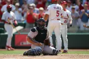 Albert Pujols St Louis Cardinals returns to the dugout as catcher - Old Photo