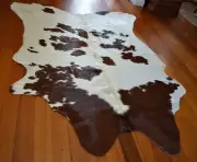Rich Browns on a Clean Bright White - A Beautiful Cowhide Rug