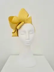 Miss Samantha. Womens loop headband fascinator in Butter yellow