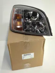 New OEM genuine GM Head Light Lamp 2000-2004 Cadillac Deville Headlight original (for: Cadillac)