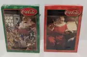 2 DECKS of Coca Cola PLAYING CARDS featuring the COKE SANTA with Toys MIP