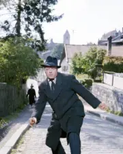 Richard Attenborough as Squadron Leader Roger Bartlett on the run - Old Photo