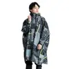 日本KIU 163228 Zakka拼布風 標準成人空氣感有袖斗篷雨衣 騎車露營 附收納袋 男女適用 (8.5折)