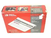 Smith Corona Spell-Right 100 Electronic Handheld Travel Dictionary & Calculator