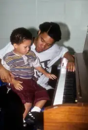 Rapper K-Solo plays piano backstage with his son when the Death Ro- Old Photo 5