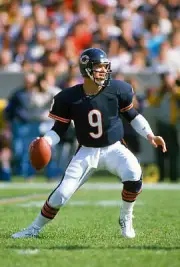Jim McMahon Chicago Bears drops back to pass in an NFL F- Football 1988 Photo 1