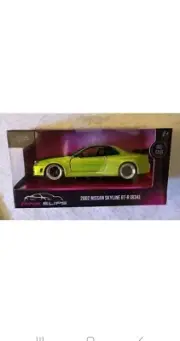 Jada Toys 2024 "Pink Slips" Green 2002 Nissan Skyline GT-R (R34) 1:32 Scale