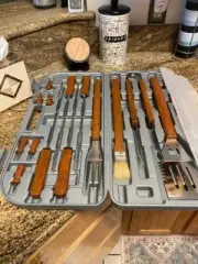 Brand new stainless steel and wood barbeque set in plastic carry box