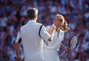 John McEnroe USA Steffi Graf of Germany shake hands after a Mixed - Old Photo