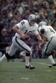 Quarterback Ken Stabler Oakland Raiders drops back to pass at a m- 1974 Photo