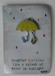 EE1 laughter sparkles like water in sunlight RAINDROPS & RAINBOWS UMBRELLA PIN