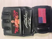 Robbie Lawler signed custom glove inscribed 'RUTHLESS' (BECKETT)