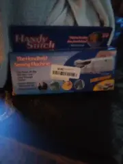 hand held sewing machine