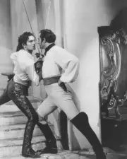 Tyrone Power Basil Rathbone engage in a sword fighting duel for Th- Old Photo