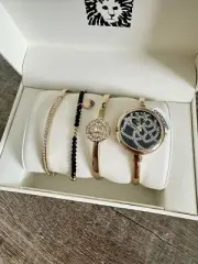 Anne Klein Women's AK/3080GBST Premium Crystal Accented Gold-Tone Bangle Watch