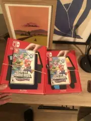 SWITCH OLED WITH SUPER MARIO BROS. WONDER. NEVER BEEN OPENED