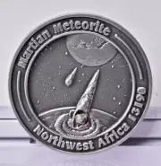 MARTIAN METEORITE INSIDE COLLECTORS COIN 0409, NORTH WEST AFRICA 13190 MT189