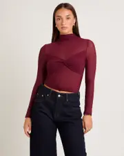 Tae Twist Detail Mesh Turtleneck