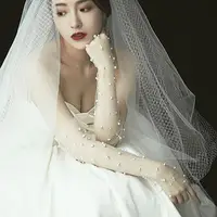 在飛比找蝦皮購物優惠-長款婚紗手套新娘全指結婚手套仙韓系蕾絲原創新款白色珍珠網紗款