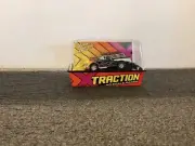 JOHNNY LIGHTNING XTRACTION HO SLOT CAR 1957 CHEVY NOMAD (BLACK WITH FLAMES)
