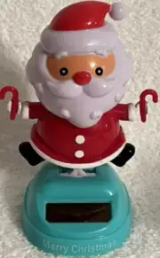 Solar Powered Dancing Merry Christmas Santa Claus Candy Canes Bobble Head NEW