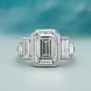 4.00ctw Emerald Cut Moissanite Engagement Ring D VVS Bezel Set Three Stone 14K W