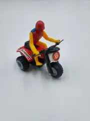 Vintage Die-cast Retro 80s pull back thee wheeler motorcycle with rider.