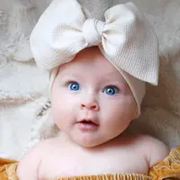 在飛比找PChome24h購物優惠-UNICO 兒童 歐美寶寶最愛玉米粒大蝴蝶結寬髮帶/髮飾