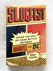 Slugfest: Inside the Epic 50-Year Battle Between Marvel and DC by Reed Tucker HC