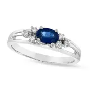 Sideways Oval Blue Sapphire and 0.10 CT. T.W. Natural Diamond Tri-Sides Split Shank Ring in Solid 14K White Gold