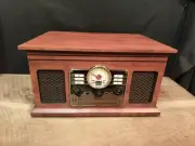 Victrola Nostalgic 6-in-1 Bluetooth Record Player & Multimedia Center Read Bio