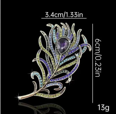 Costume Jewelry Peacock Feather Brooch. NIB. Gold metal Rhinestones