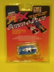 ORIGINAL TOMY AFX AUSTRALIAN CARD TOYOTA MINOLTA # 36 MINT NEW ON CARD SEALED!!